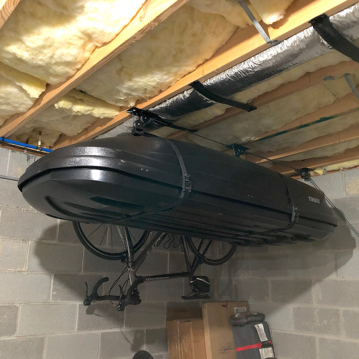 Teal Triangle support team provides setup guidance for garage lift.
