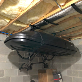 Teal Triangle support team provides setup guidance for garage lift.