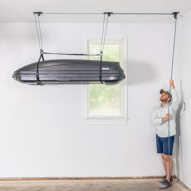 Teal Triangle pulley lift system demonstrates mechanical advantage for easy loading.