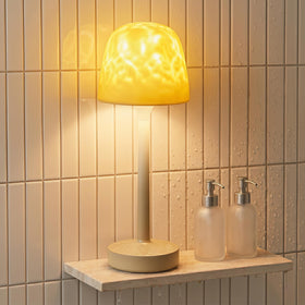 Tedmos IP65 waterproof shower lamp ready for direct water exposure.