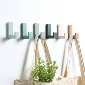 Teenyyou 6-pack kids wall hooks green for organized coats and backpacks in a bright room