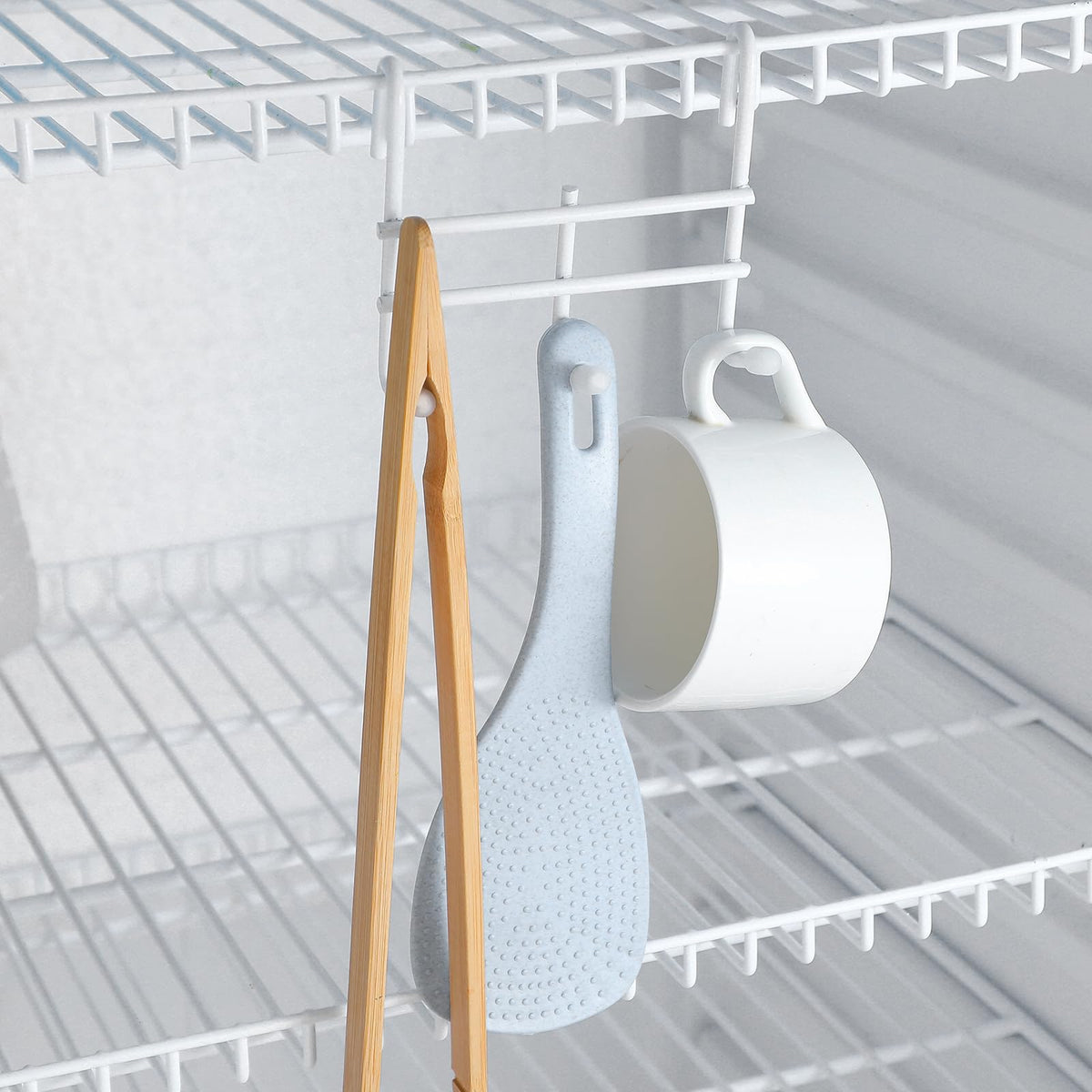 Teenyyou sleek hanging hooks preserve shelf aesthetics while adding capacity.