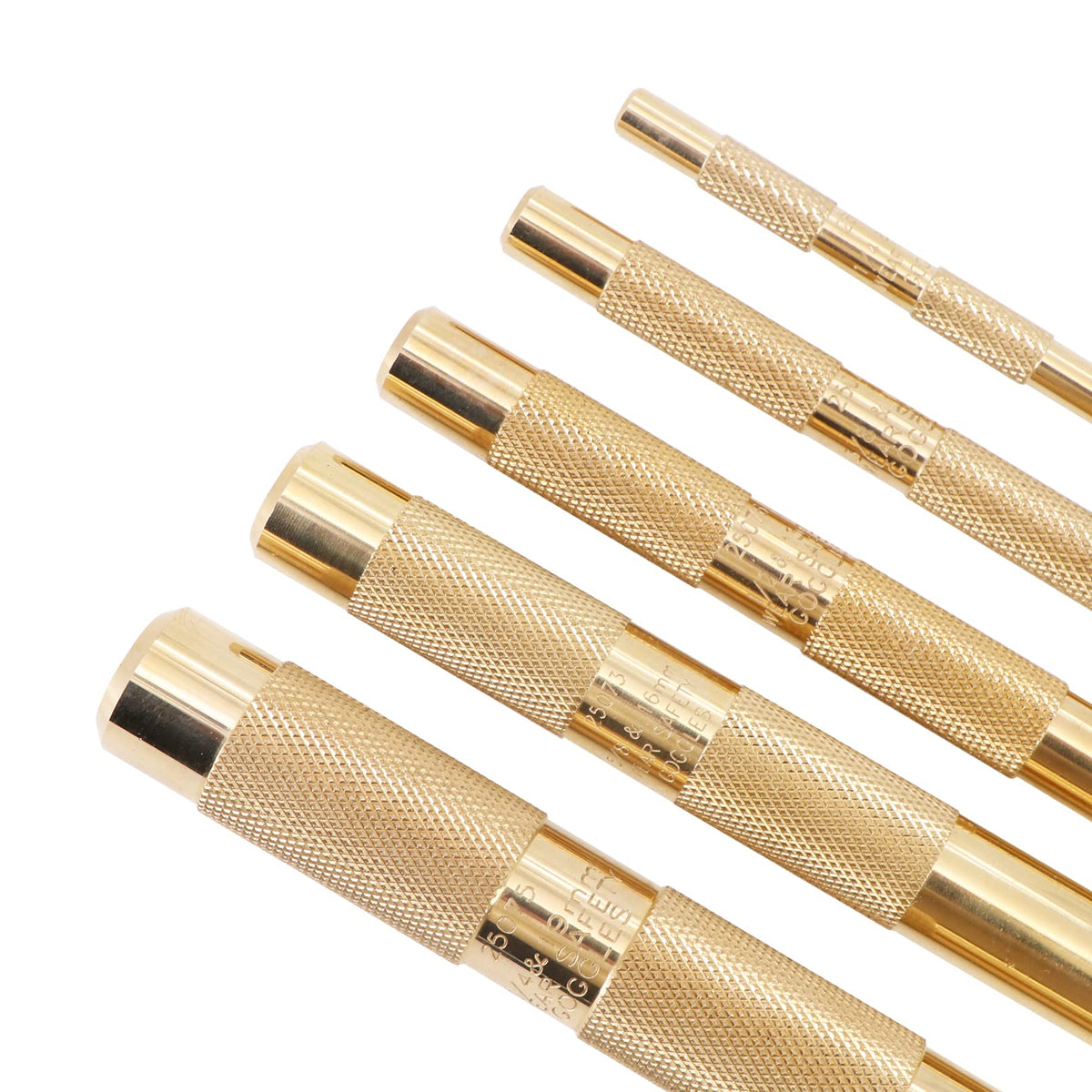 Tektall brass drift punch in hand shows comfortable, secure grip.