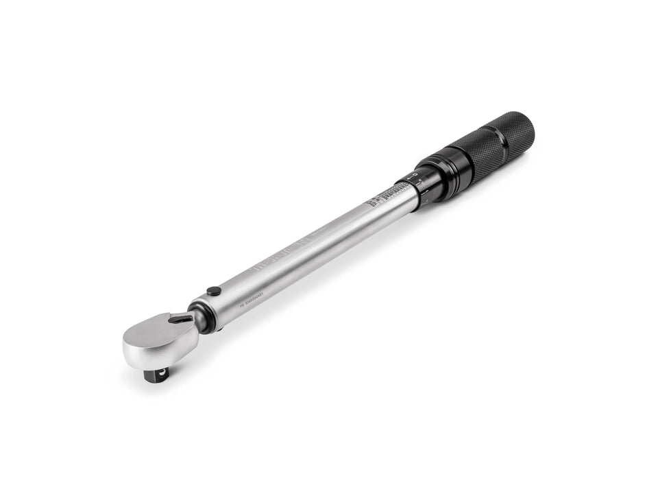 TEKTON 3/8-inch drive torque wrench in action showing dual-direction accuracy.