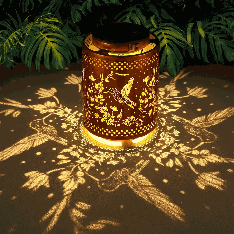Tepaken Hummingbird solar lantern pattern glows at dusk for garden charm