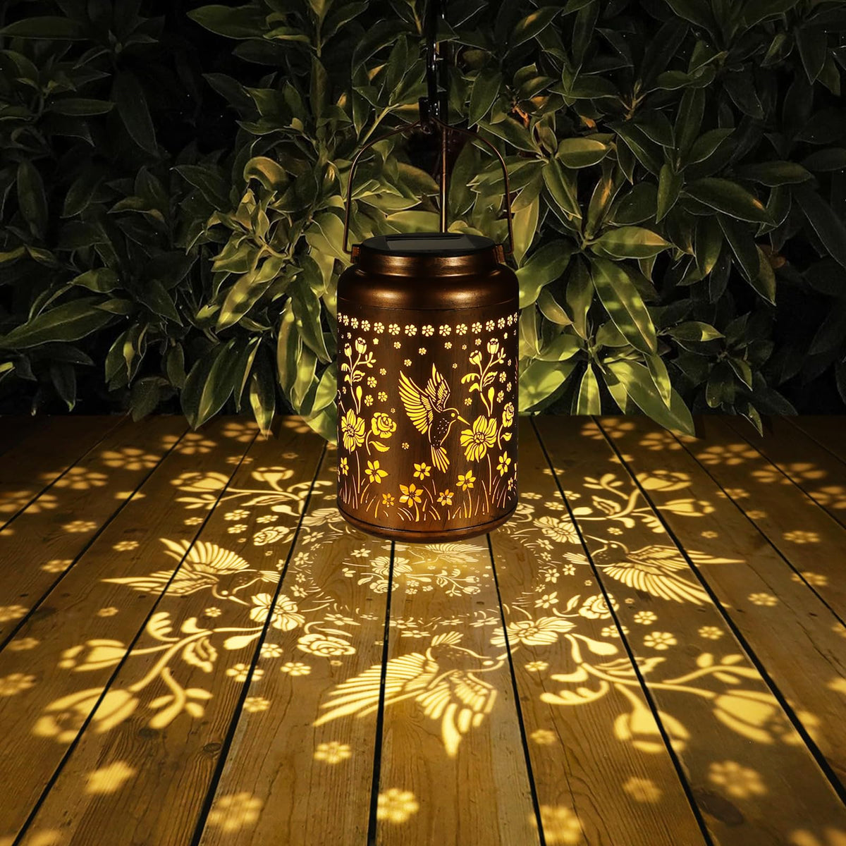 Tepaken solar lantern in gold copper finish adds elegant patio decor.
