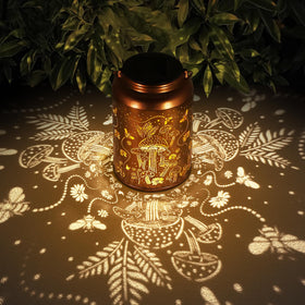 Tepaken solar lantern with gold mushroom pattern for warm garden ambiance