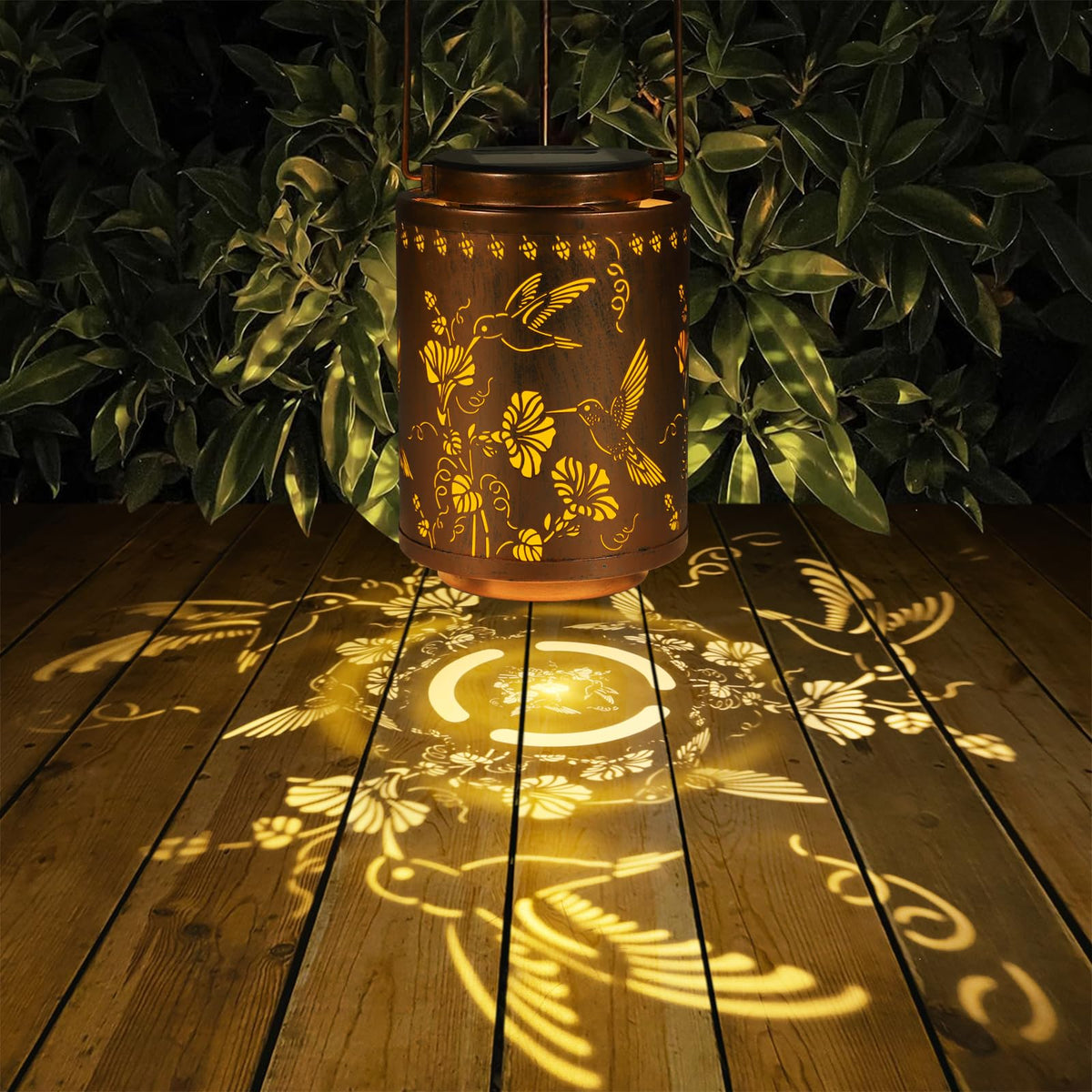 Tepaken solar lantern hanging on a tree for easy outdoor lighting.