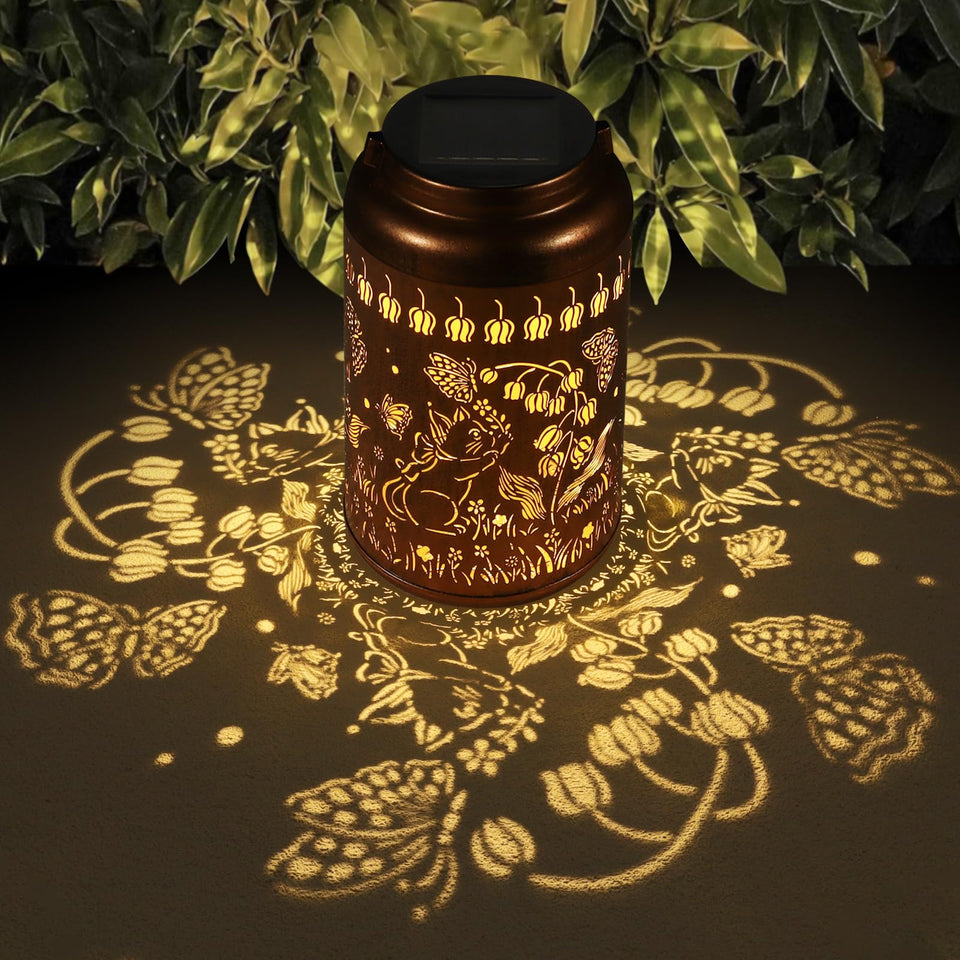 Tepaken solar lantern with hummingbird motif in copper finish for outdoor ambiance