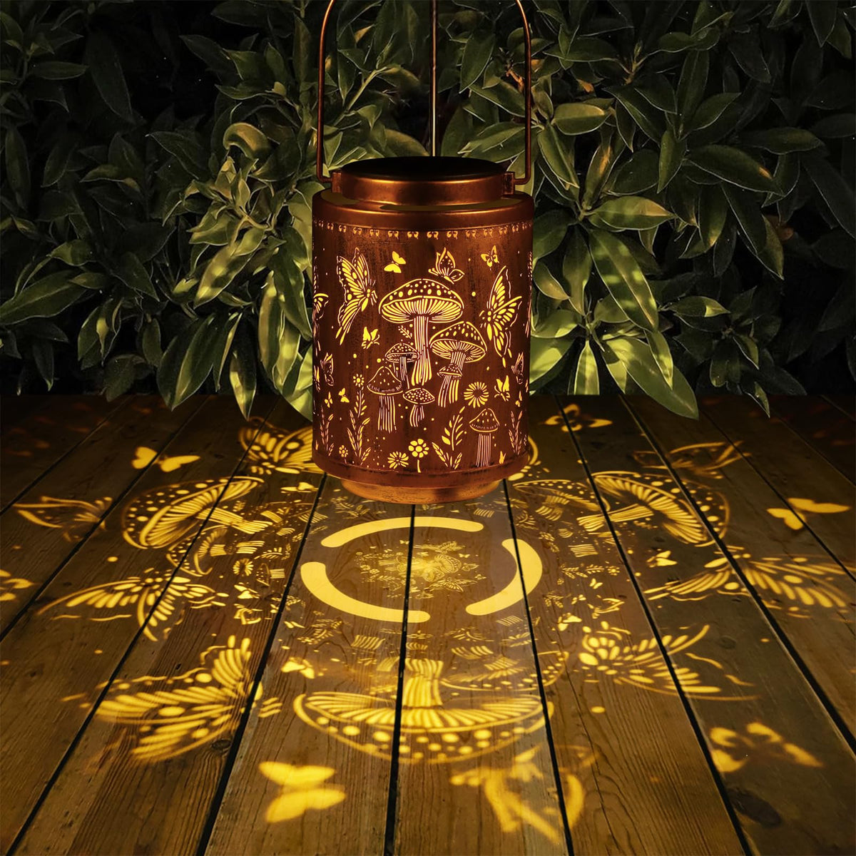 Tepaken metal hanging lantern for yard decor provides warm LED light.