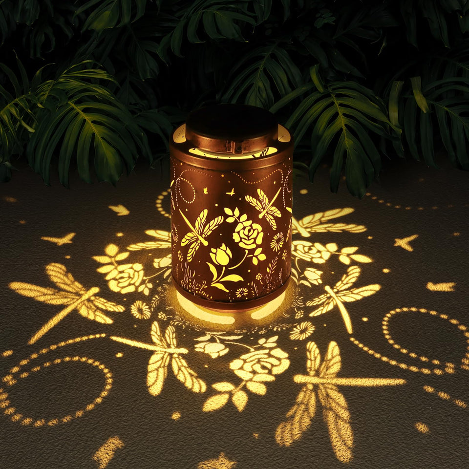 Tepaken solar lantern with dragonfly pattern hanging to enhance garden ambiance
