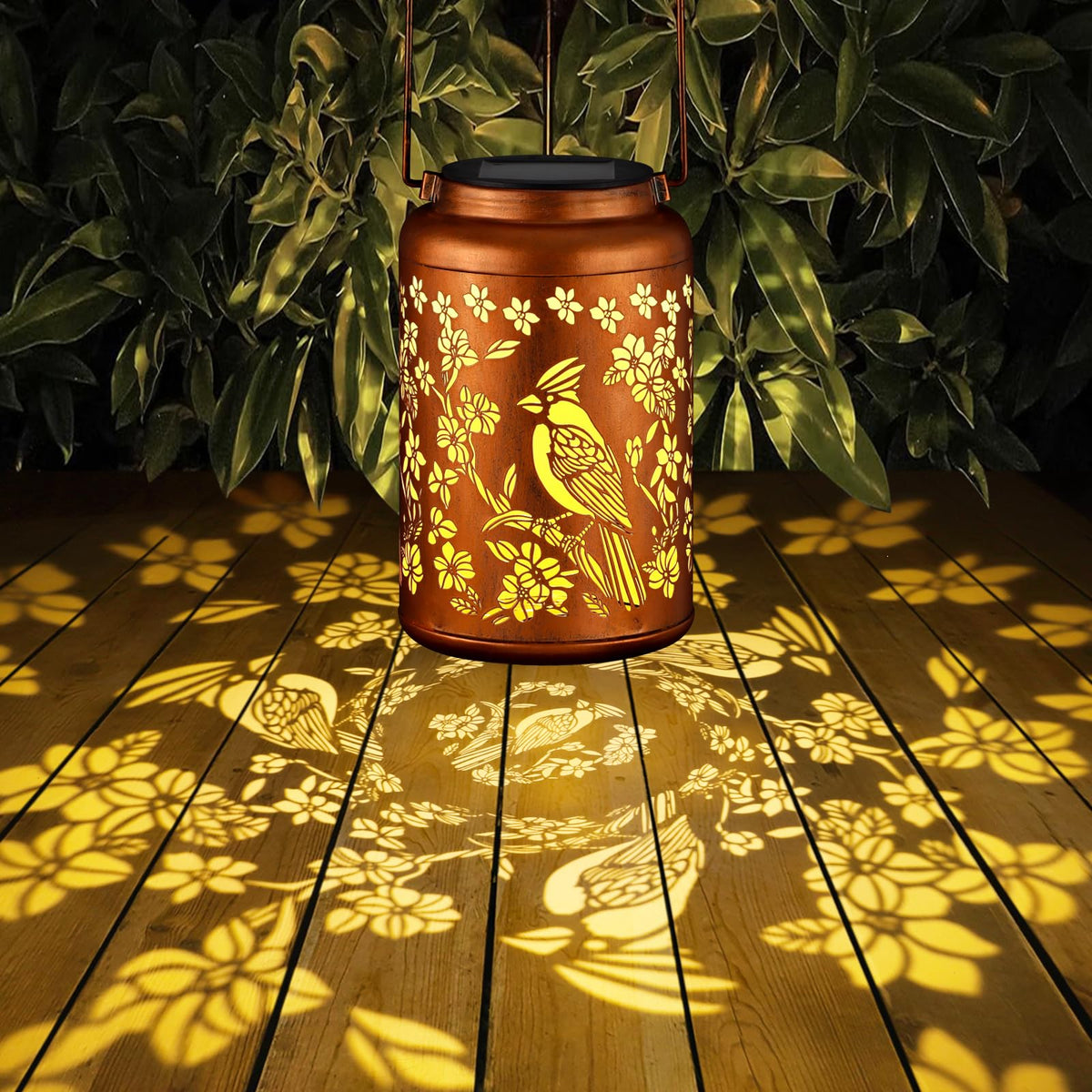 Tepaken Red Bird Solar Lanterns on flat surface brighten patios without wiring.