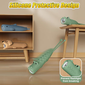 Tepreswes crocodile kids flashlight side view, compact and comfortable for little hands.
