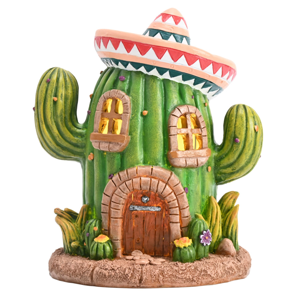Teresa's Collections cactus fairy house Cinco de Mayo decor glows softly at night in outdoor spaces.