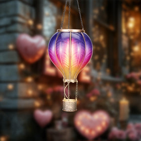 TERESA'S COLLECTIONS flickering flame lantern illuminates outdoor patios with a festive vibe