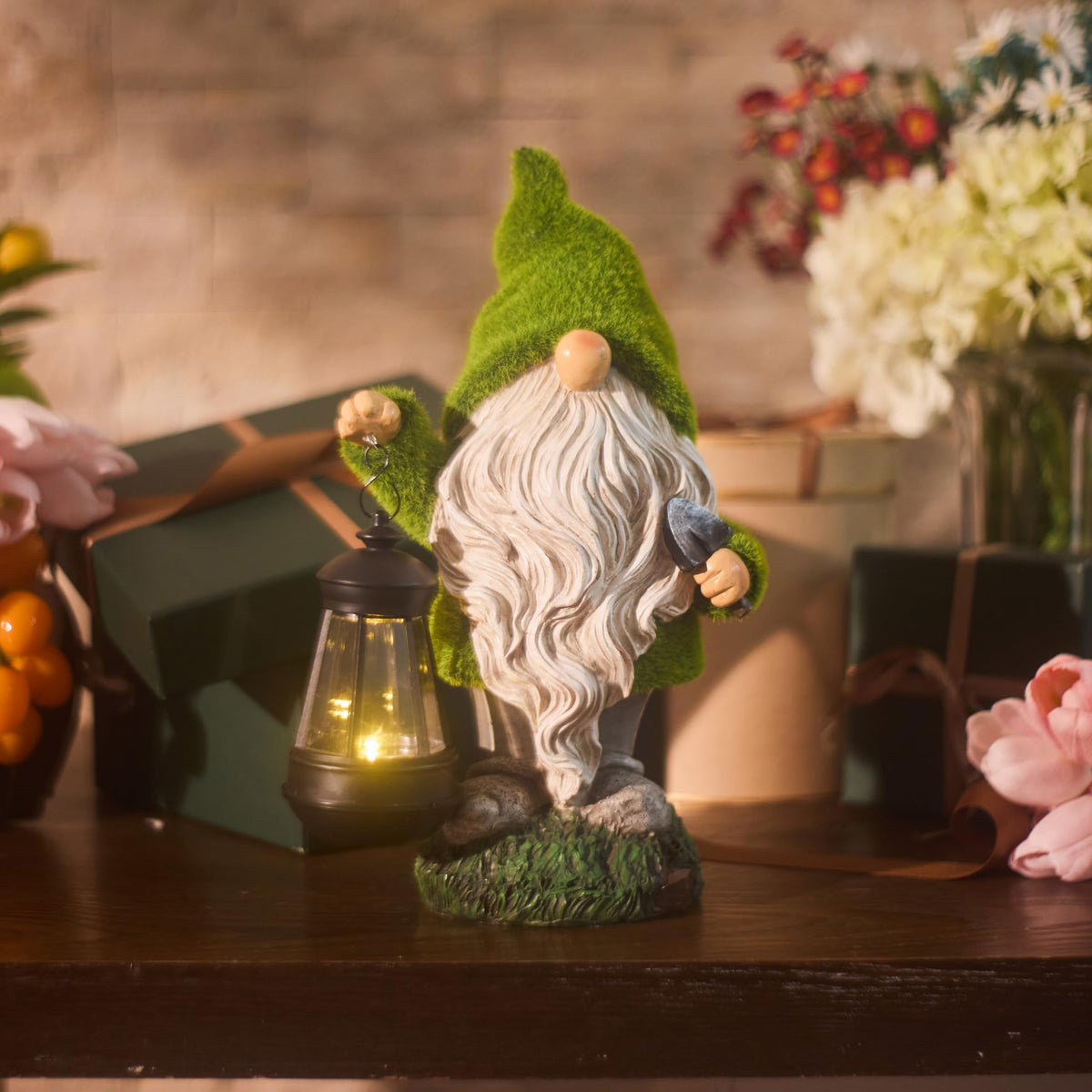 TERESA'S COLLECTIONS hand-painted resin gnome stands up to rain for durable décor.