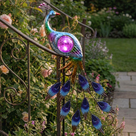 Teresa's Collections solar-powered decor creates soft, colorful glow after dusk
