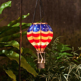 TERESA'S COLLECTIONS 18-inch lantern creates a welcoming glow for porches, lawns, or balconies.