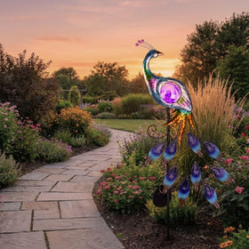 Teresa's Collections peacock garden stake adds vibrant color along lawn and pathways
