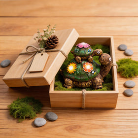 Teresa's Collections solar-light turtle statue illuminates paths and gardens at night.
