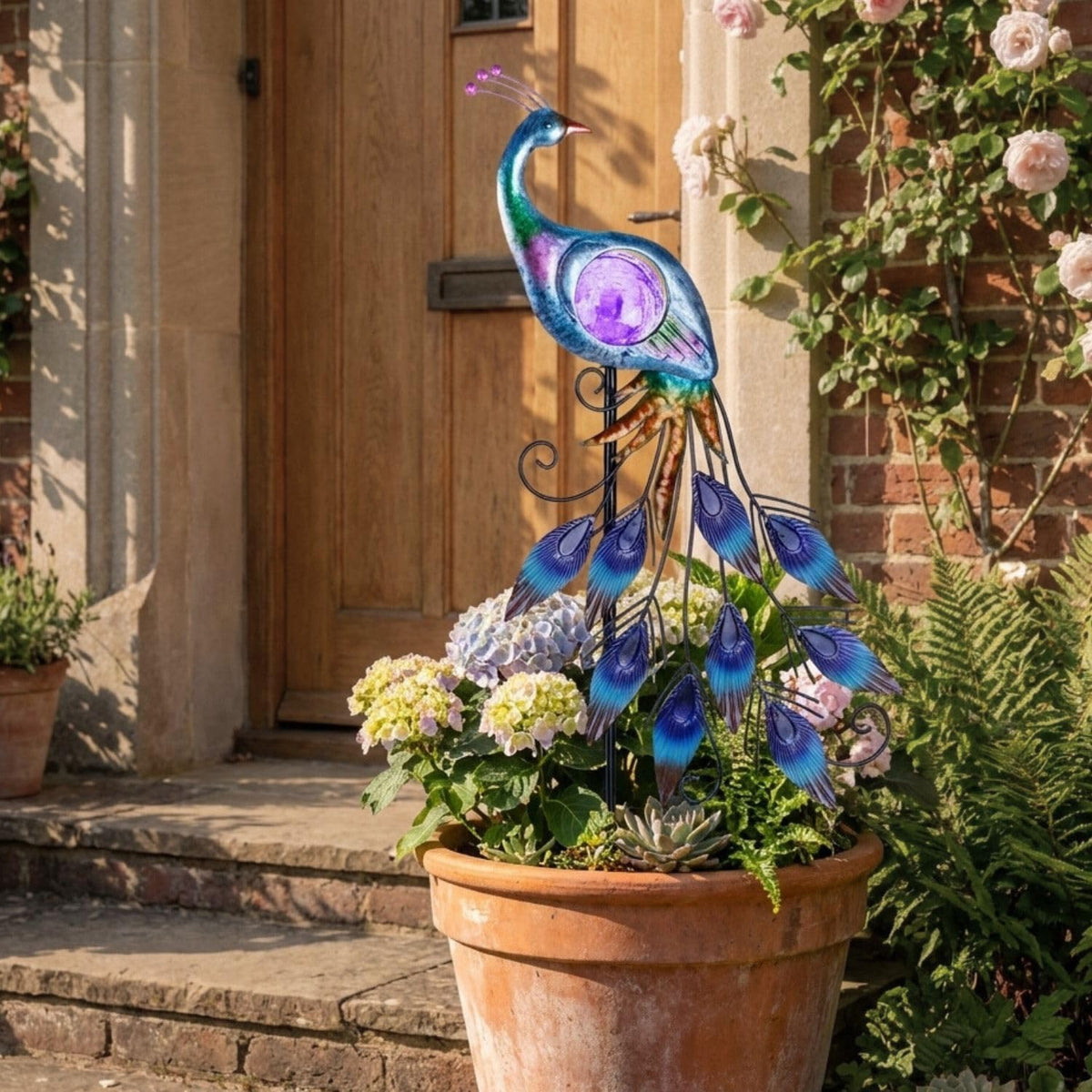 Teresa's Collections rust-resistant finish keeps the sculpture durable in all weather
