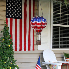 TERESA'S COLLECTIONS solar powered outdoor lantern lights automatically at night for long-lasting ambiance.
