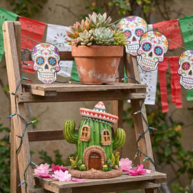 Teresa's Collections weather-resistant resin statue endures sun and rain while keeping whimsy alive.
