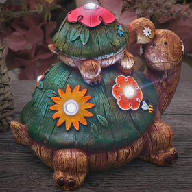 Teresa's Collections weather-resistant resin sculpture provides durable outdoor decor year-round.