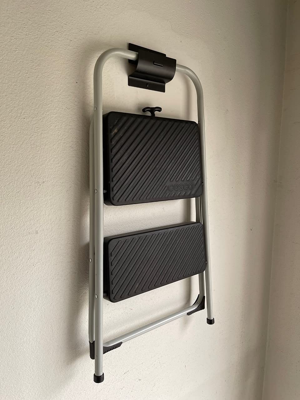 Two GMH-01-2P hangers mounted together for wheelbarrows and ladders organization