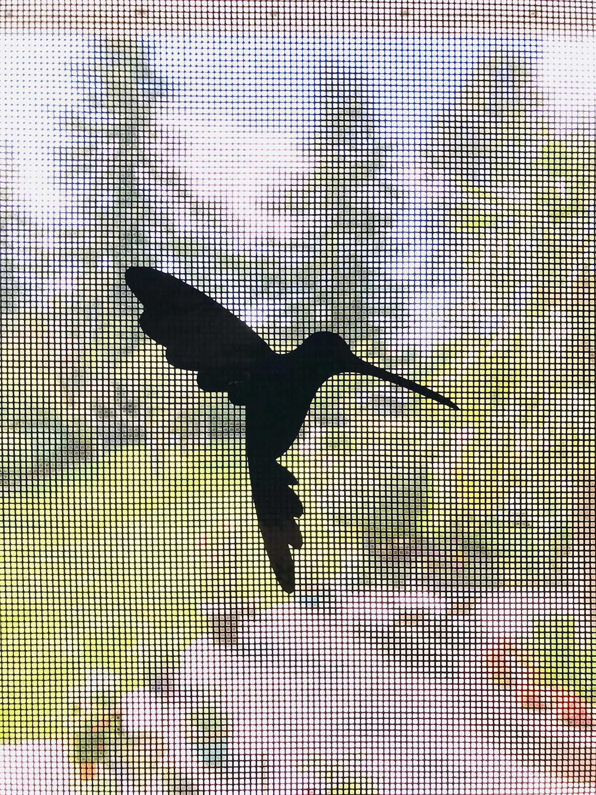 The Decal Empire retractable screen door decal applied on a screen to prevent collisions.