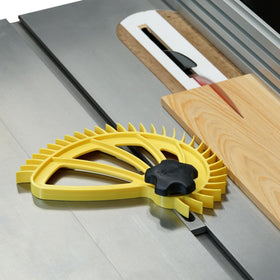 The Hedgehog featherboard on a table saw demonstrates quick pivot adjustment.