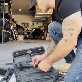 The Ryker Bag features detachable pouches with D-loops for small items like drill bits.