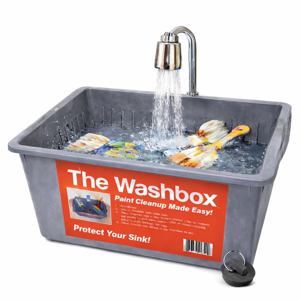 The Washbox inside-sink tray catching paint and keeping the sink clean.