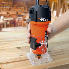THINKWORK Router Tool kit contents with router bits and guides.