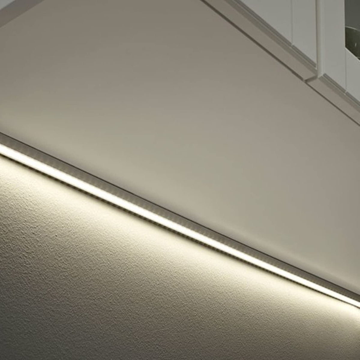 THMOOTHER flush-mounted diffuser assembly creates sleek, professional under-cabinet lighting.