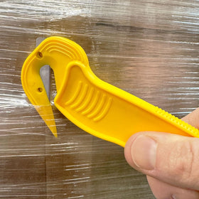 Cuts tape and plastic straps without damaging products.