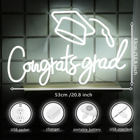 Threan grad neon sign warm glow on wall enhances photo booth backgrounds.