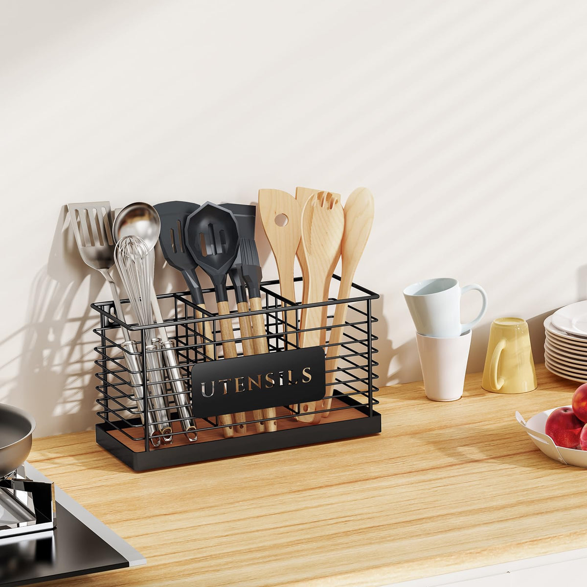 Holder with utensils in use demonstrates quick reach during cooking