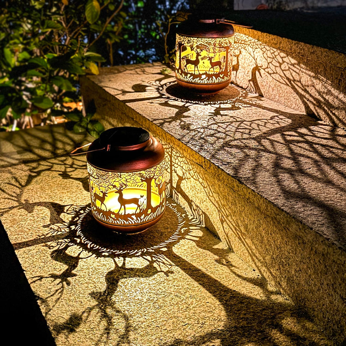 TIGGSY antique bronze openwork lantern enhances garden decor with artistic lighting.