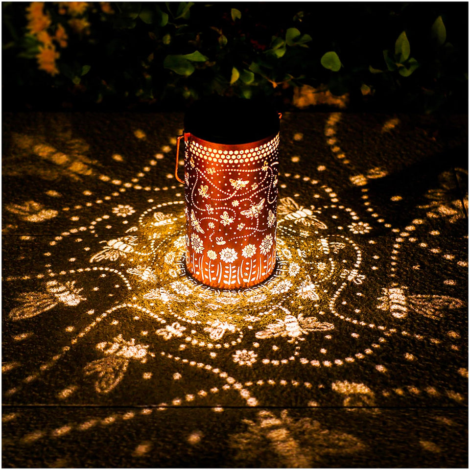 TIGGSY Bee Solar Lantern garden pattern projection for ambient evenings.