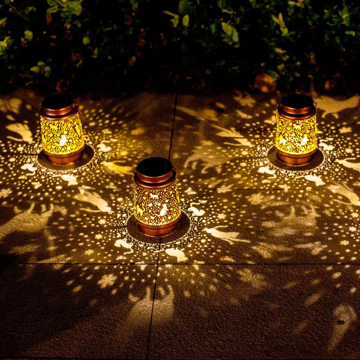 TIGGSY Cat Solar Lantern night illumination creates cozy outdoor ambiance.