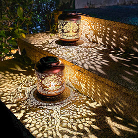 TIGGSY Decorative metal lantern for yard and patio accents.