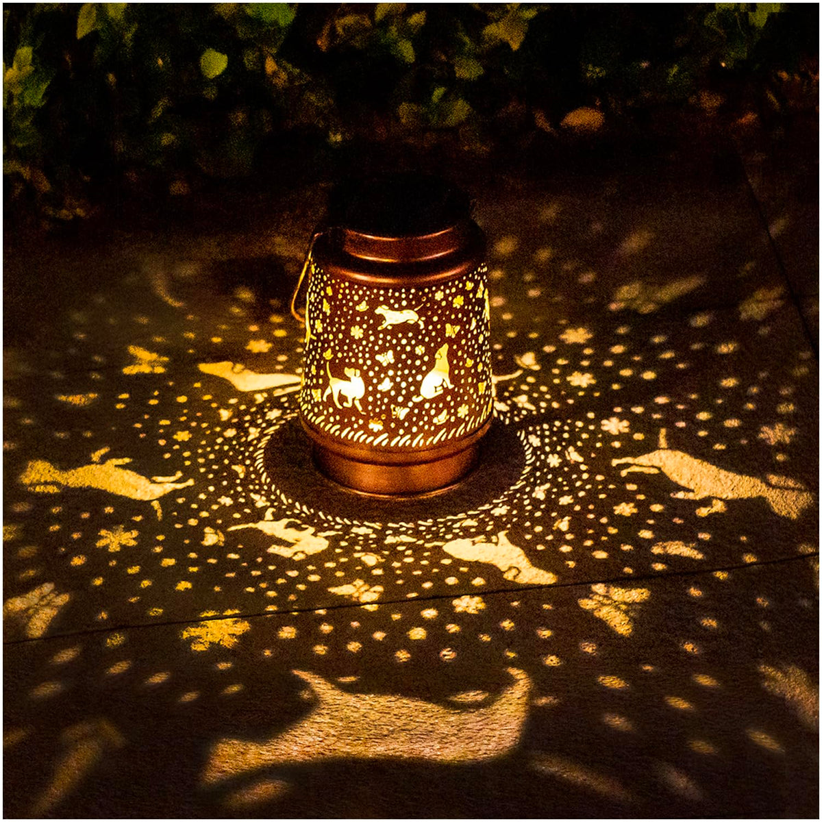 TIGGSY dog solar lantern hanging outdoors creates soft garden glow