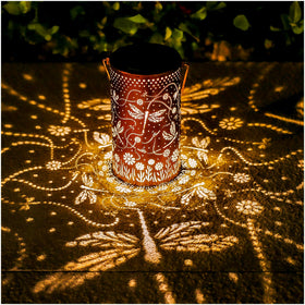 TIGGSY dragonfly solar lantern hanging outdoors adds warm ambient light