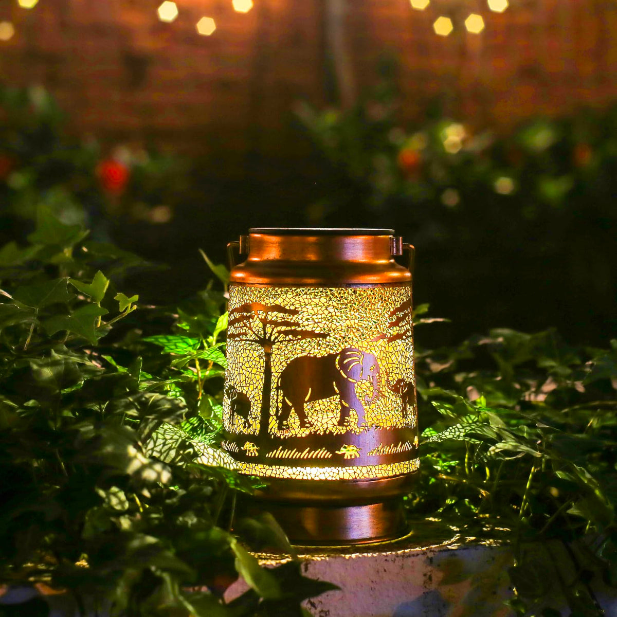 TIGGSY Elephant solar lantern bronze design adds antique charm outdoors.