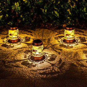TIGGSY Elephant solar lantern table decor adds ambient light.