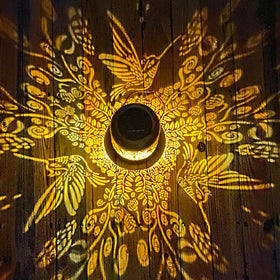 TIGGSY hanging solar lantern with bronze finish enhances outdoor décor