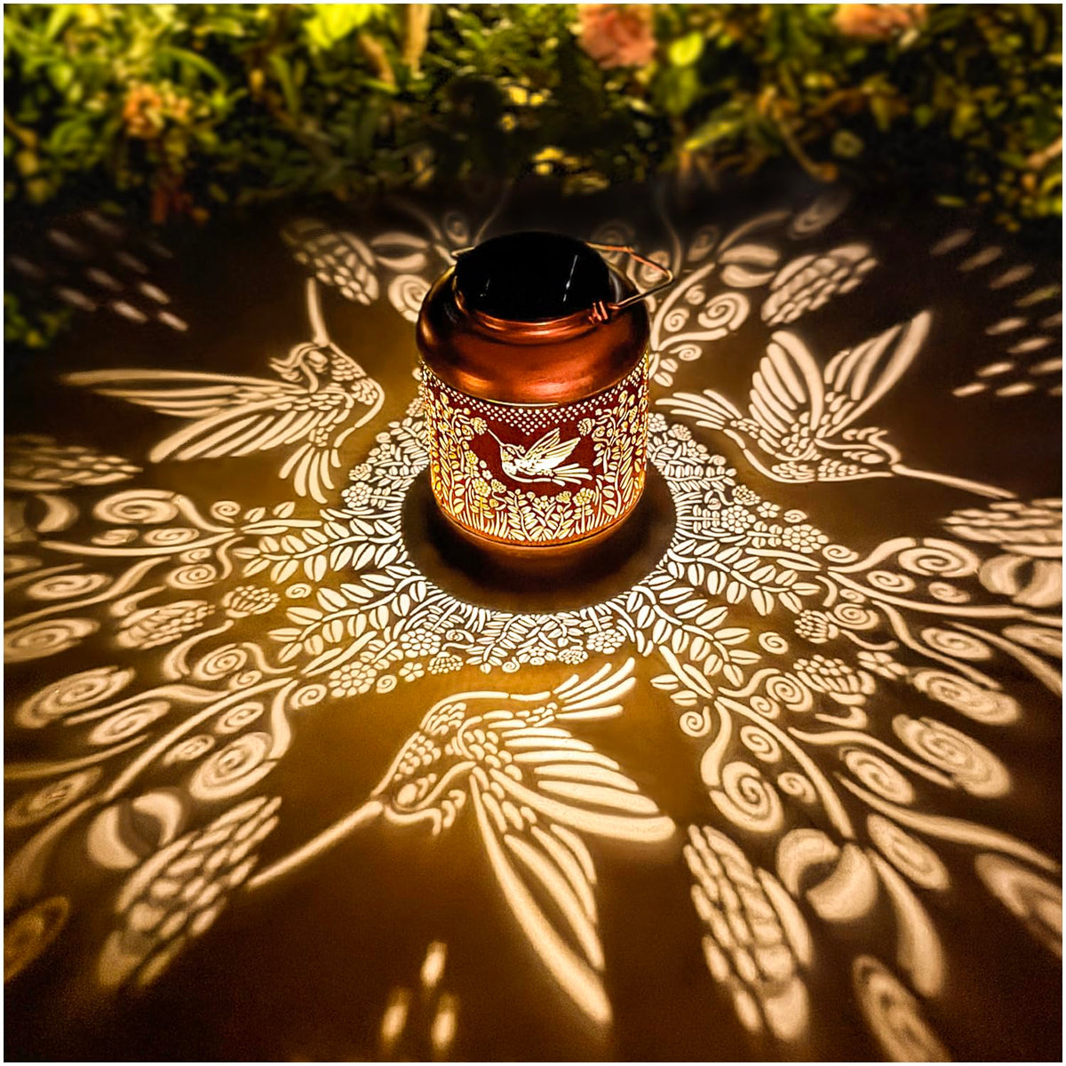 TIGGSY hummingbird solar lantern pattern projection for warm garden ambience