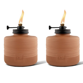 TIKI Amber Horizon table torch with adjustable flame for cozy outdoor ambiance.