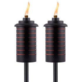 TIKI metal black orange torch full-size 64-inch setup for dramatic backyard lighting.